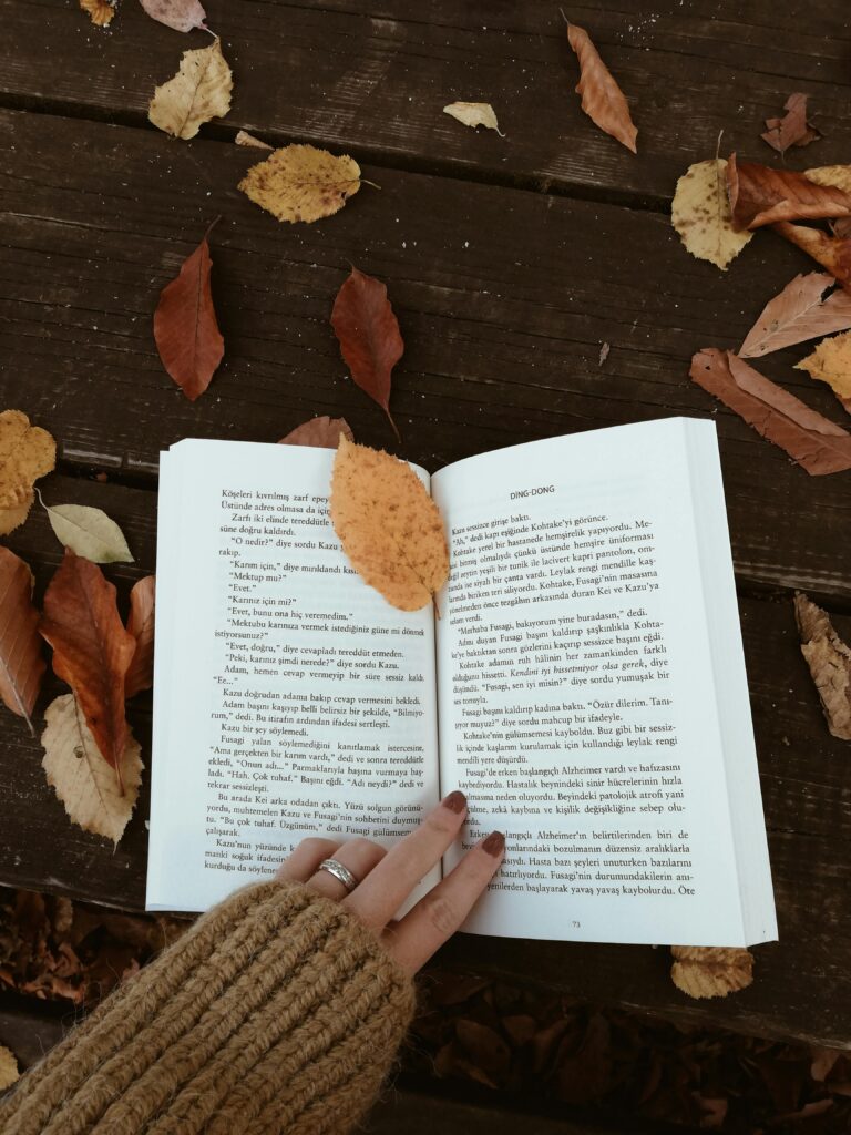 Person Holding an Open Book